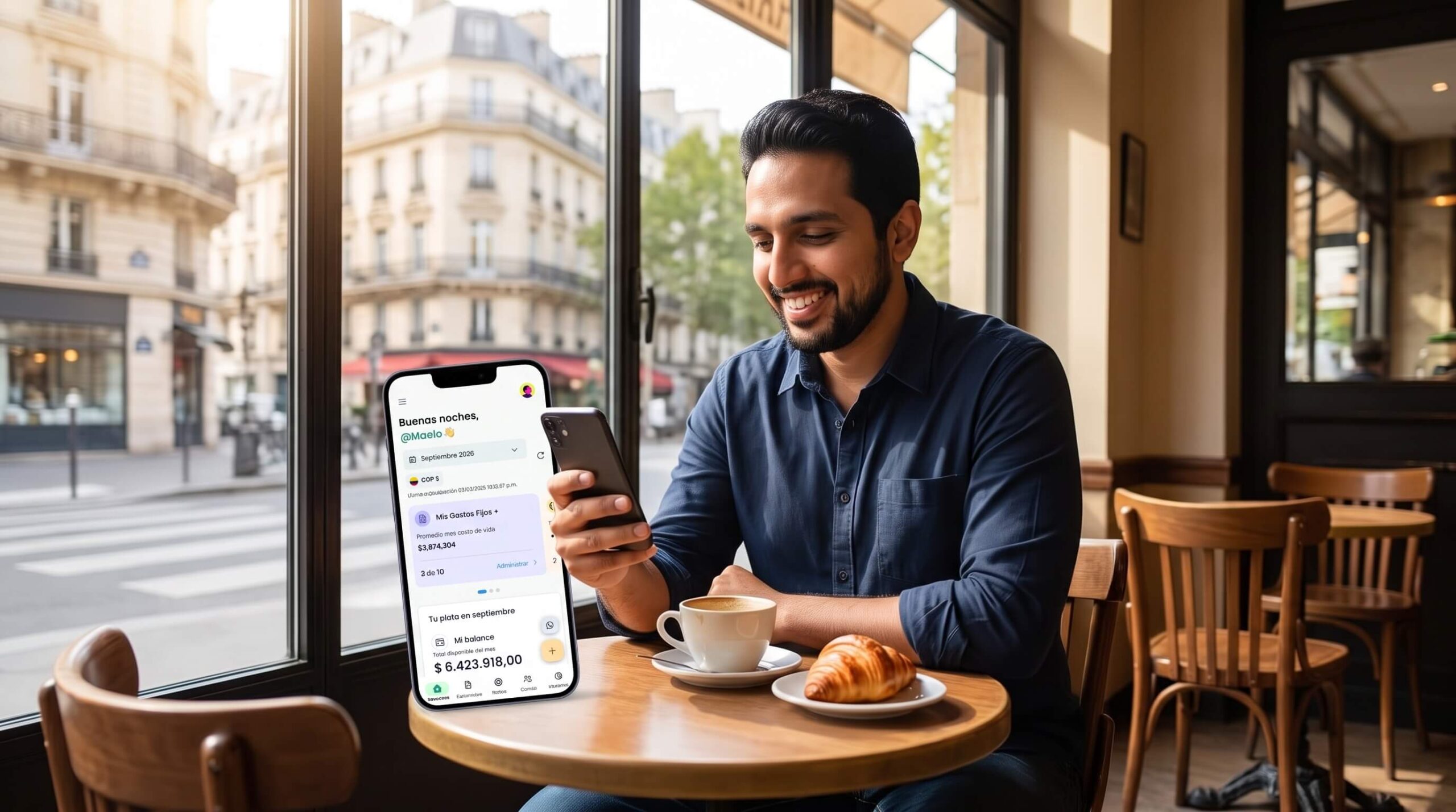 Gabriel revisando sus finanzas en el celular